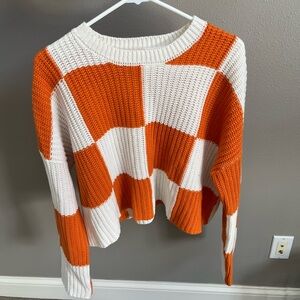 moon & madison Bold Orange and White Checkered Sweater